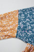Mixed Print Patchwork Ruffled Hem Round Neck Blouse