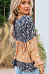 Mixed Print Patchwork Ruffled Hem Round Neck Blouse