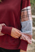 Mixed Print Patchwork Sleeve Relaxed Fit Pullover Sweatshirt