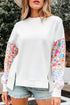 Mixed Print Sleeve Exposed Seam Pullover Sweatshirt
