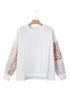 Mixed Print Sleeve Exposed Seam Pullover Sweatshirt