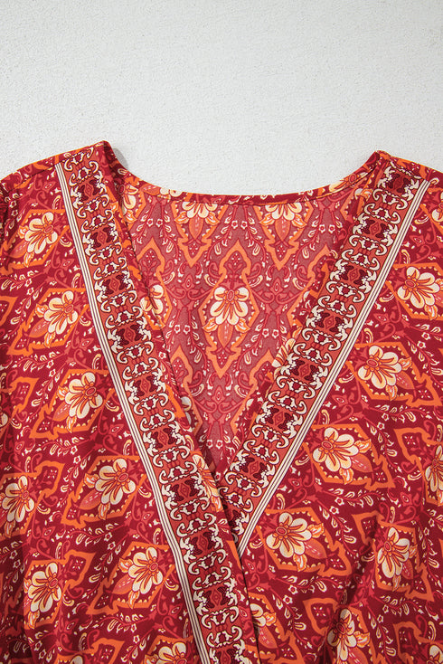 Orange Plus Size Printed Surplice Neck Empire Waist Flowy Mini Dress