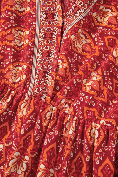 Orange Plus Size Printed Surplice Neck Empire Waist Flowy Mini Dress