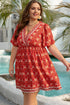 Orange Plus Size Printed Surplice Neck Empire Waist Flowy Mini Dress
