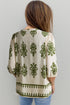 Ornamental Print Button Front Tie Neck Blouse