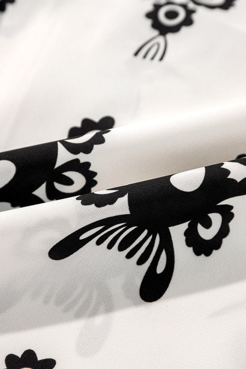 Ornamental Print Three Quarter Sleeve V Neck Blouse
