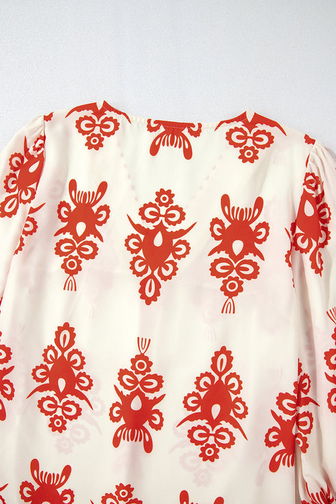 Ornamental Print Three Quarter Sleeve V Neck Blouse