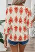 Ornamental Print Three Quarter Sleeve V Neck Blouse