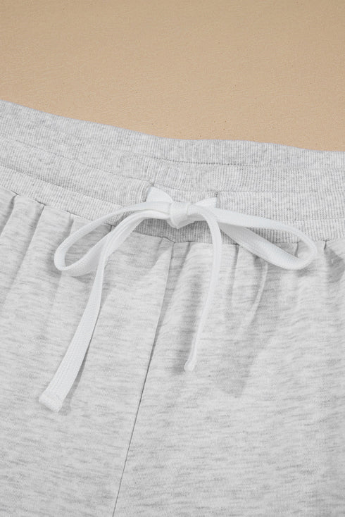Patchwork Print Uneven Hem Pullover Shorts Loungewear