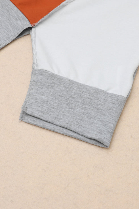 Patchwork Stitching Irregular Hem Long Sleeve Relaxed Top