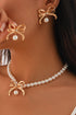 Plated Rhinestone Bow Imitation Pearl Necklace Earring Set