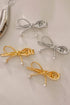 Polished Metal Bow Knot Pearl Accent Hair Clip