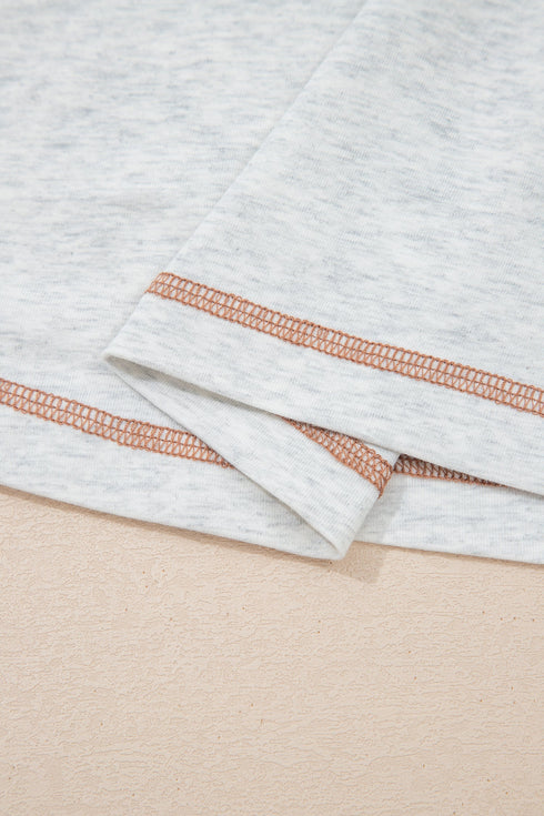 Raw Seam Detail Geometric Paneled Buttoned Henley Tee
