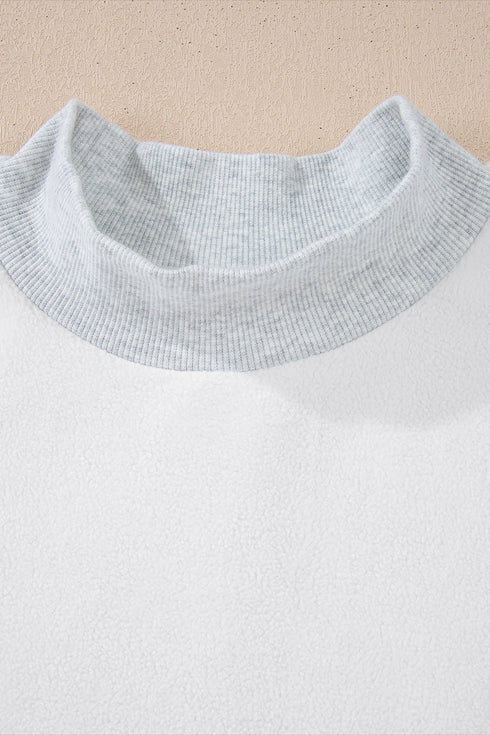 Relaxed Fit Exposed Seam Mock Neck Pullover Sweatshirt
