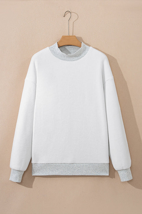 Relaxed Fit Exposed Seam Mock Neck Pullover Sweatshirt