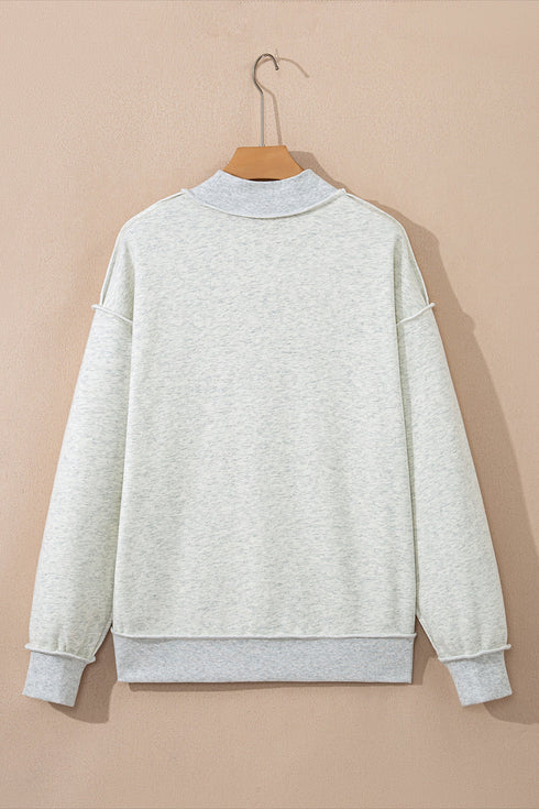 Relaxed Fit Exposed Seam Mock Neck Pullover Sweatshirt