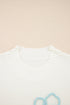 Relaxed Mock Neck Embroidered Floral Graphic Sweater