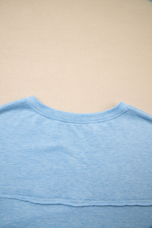 Relaxed Notched Neckline Raw Edge Cotton Blend Terry Top