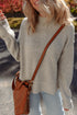 Relaxed Waffle Knit Mock Neck Exposed Seam Sweater
