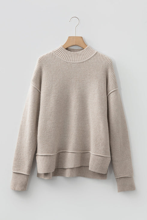 Relaxed Waffle Knit Mock Neck Exposed Seam Sweater