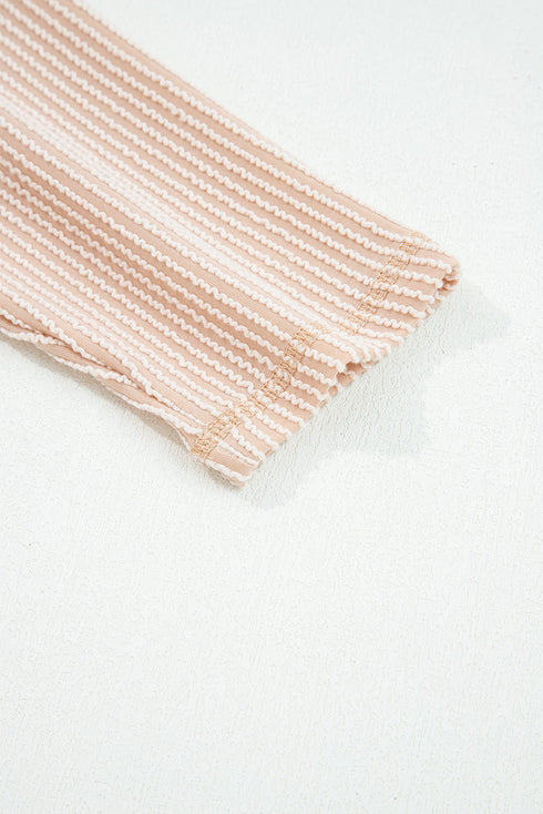 Ribbed Knit Twist Front Exposed Seam Long Sleeve Top