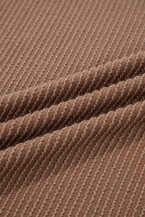 Ribbed Knit Twist Front Exposed Seam Long Sleeve Top
