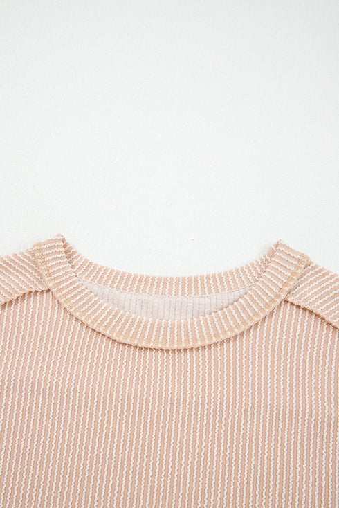 Ribbed Knit Twist Front Exposed Seam Long Sleeve Top