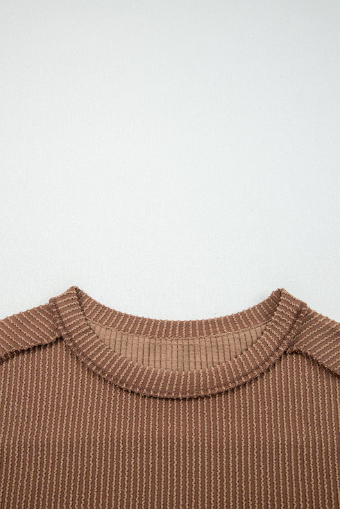 Ribbed Knit Twist Front Exposed Seam Long Sleeve Top