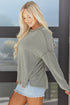 Ribbed Knit Twist Front Exposed Seam Long Sleeve Top