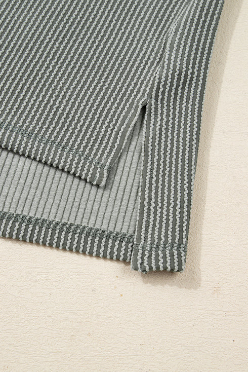 Ribbed Knit Twist Front Exposed Seam Long Sleeve Top