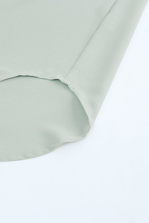 Ruffled Sleeveless V Neck Top