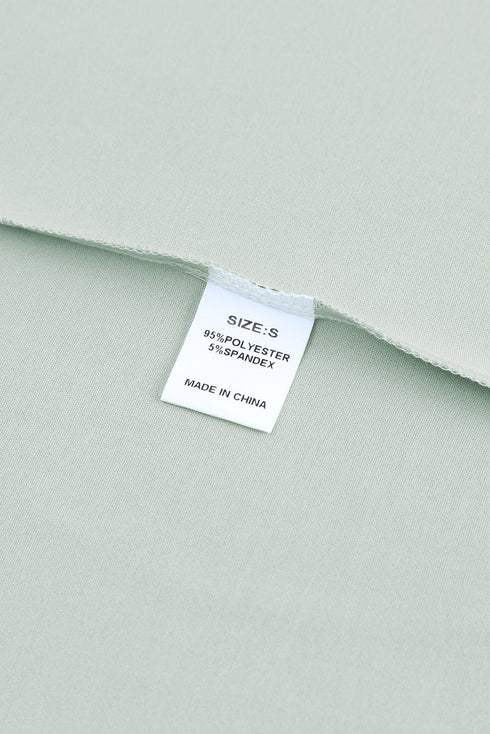 Ruffled Sleeveless V Neck Top