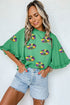 Sequin Doughnut Graphic Ruffled Trim Bell Sleeve Blouse