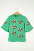 Sequin Doughnut Graphic Ruffled Trim Bell Sleeve Blouse