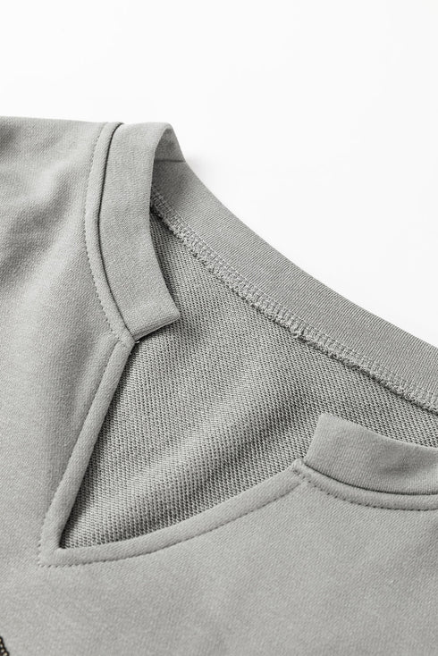 Sequin Graphic Notched Neck Long Sleeve Loose Tee