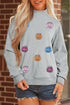 Sequin Pumpkin Face Graphic Mock Neck Sweatshirt