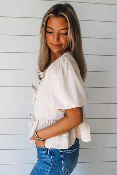 Short Puff Sleeve Bow Tie Ruffle Hem Blouse