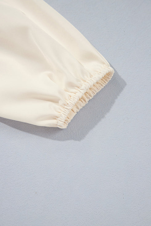 Smocked Ruffle Hem Unprinted Long Sleeve Blouse