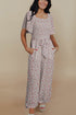 Smocked Short Sleeve Wide Leg Floral Print Jumpsuit