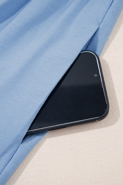 Solid Color Pocketed Raw Edge Babydoll Dress