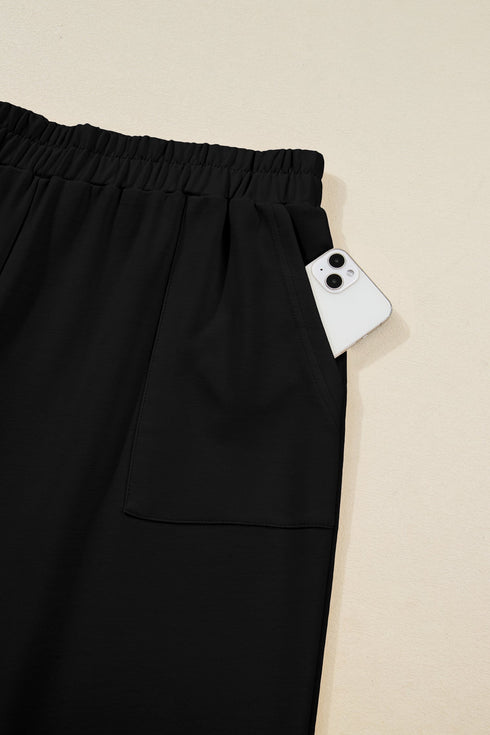 Solid Elastic Waist Asymmetrical Hem Loose Capri Pants