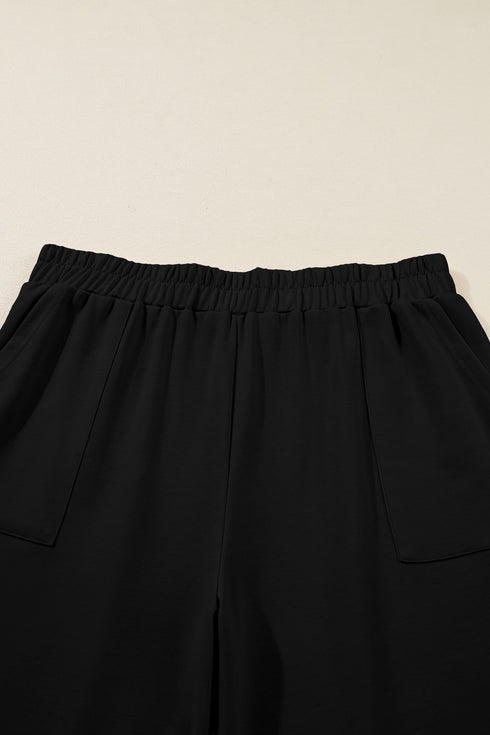 Solid Elastic Waist Asymmetrical Hem Loose Capri Pants