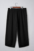 Solid Elastic Waist Asymmetrical Hem Loose Capri Pants