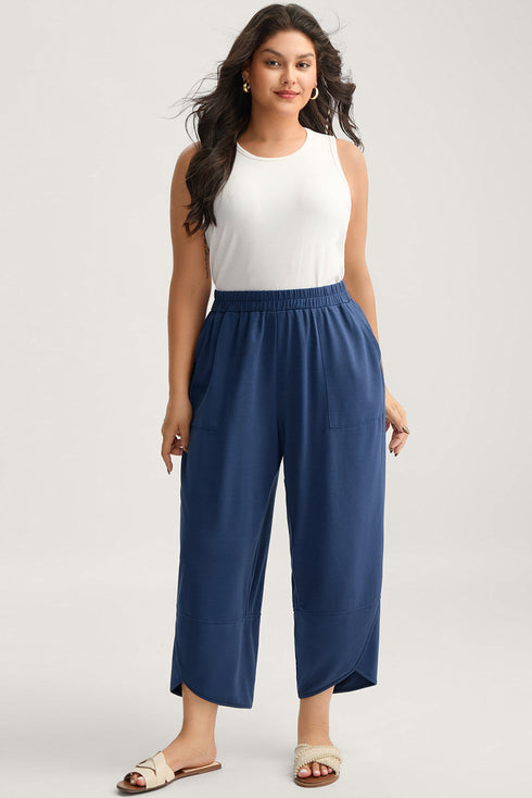 Solid Elastic Waist Asymmetrical Hem Loose Capri Pants