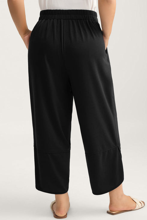 Solid Elastic Waist Asymmetrical Hem Loose Capri Pants