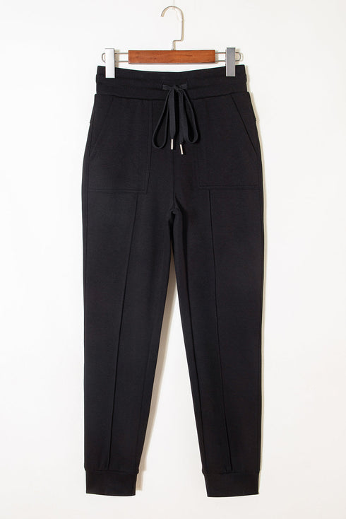 Solid Exposed Seam Detail Skinny Drawstring Jogger Pants