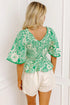 Southern Belle All Over Floral Smocked V Neck Blouse
