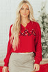 Split Neck Embellished Graphic Raw Hem Pullover Sweatshirt