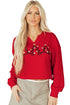 Split Neck Embellished Graphic Raw Hem Pullover Sweatshirt