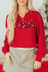 Split Neck Embellished Graphic Raw Hem Pullover Sweatshirt